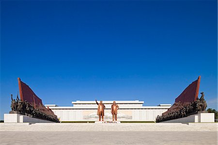 simsearch:862-06677209,k - Democratic Peoples Republic of Korea. North Korea, Pyongyang, Mansu Hill. Statues of Kim Il Sung and Kim Jong Il at the Mansudae Grand Monument. Stock Photo - Rights-Managed, Code: 862-06677231