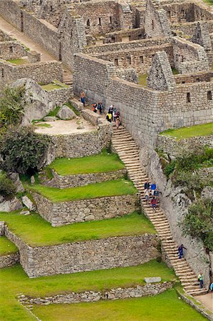 simsearch:862-06677269,k - South America, Peru, Cusco, Machu Picchu. A general view of terraces and buildings at the World Heritage listed Inka Historic Sanctuary of Machu Picchu, situated in the Andes above the Urubamba valley Stock Photo - Rights-Managed, Code: 862-06677255