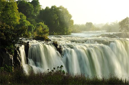 Victoria Falls at sunrise,  Zambezi River, near Victoria Falls, Zimbabwe, Africa Foto de stock - Con derechos protegidos, Código: 862-06677647