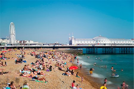 sunbathing crowd - Europe, United Kingdom, Brighton beach and Brighton Pier Stock Photo - Rights-Managed, Code: 862-06825312