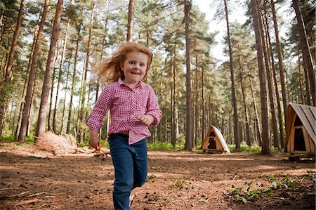 family photos playground - Nottinghamshire, UK. A child runs through Sherwood Pines forest park. (MR) Stock Photo - Rights-Managed, Code: 862-06825332