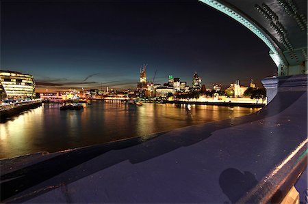 swiss re tower - The City of London seen from Tower Bridge. From left to right: Walkie Talkie, Tower 42 and Gherkin. Stock Photo - Rights-Managed, Code: 862-06825394