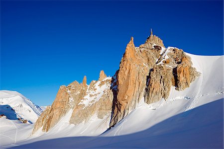 snow covered cliff - Europe, France, Haute Savoie, Rhone Alps, Chamonix Valley, Aiguille du Midi Stock Photo - Rights-Managed, Code: 862-06825452