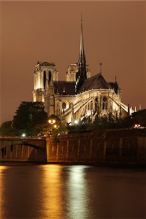 river notre dame paris - Notre Dame Cathedral is a historic Roman Catholic Marian cathedral on the eastern half of the Ile de la Cite in the fourth arrondissement of Paris, France. Stock Photo - Rights-Managed, Code: 862-06825491