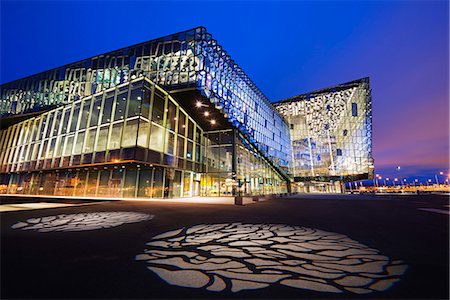 Iceland, Reykjavik, Harpa Concert Hall and Conference Center, the glass facade was designed by Olafur Eliasson and Henning. Stock Photo - Rights-Managed, Code: 862-06825636