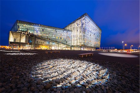 Iceland, Reykjavik, Harpa Concert Hall and Conference Center, the glass facade was designed by Olafur Eliasson and Henning. Stock Photo - Rights-Managed, Code: 862-06825638