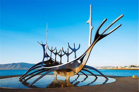 european modern outdoor sculpture art - Iceland, Reykjavik, Solfar (Sun Voyager), iconic stainless-steel modern sculpture representing a Viking longboat by Jon Gunnar Arnason Stock Photo - Rights-Managed, Code: 862-06825649