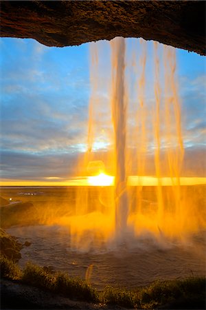 seljalandsfoss waterfall - Iceland, southern region, Seljalandsfoss waterfall, sunset Foto de stock - Direito Controlado, Número: 862-06825666