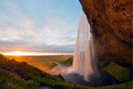 seljalandsfoss waterfall - Iceland, southern region, Seljalandsfoss waterfall, sunset Fotografie stock - Rights-Managed, Codice: 862-06825667