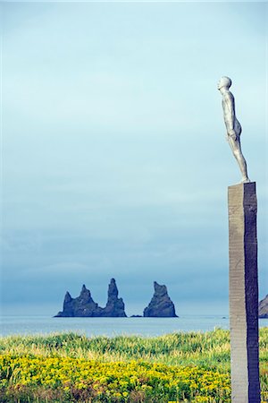 rural sculpture - Iceland, southern region, Vik, rock stacks off the coast at Reynisdrangar, Voyage - a seafarers memorial statue Stock Photo - Rights-Managed, Code: 862-06825686