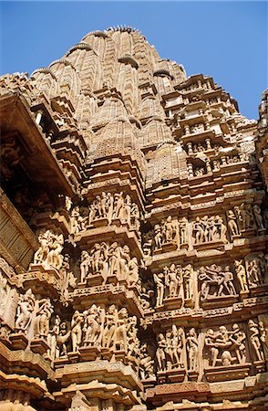 Asia, India, Madhya Pradesh, Khajuraho. Kandariya Mahadev temple, detail of erotic sculptures adorning the exterior. Foto de stock - Con derechos protegidos, Código: 862-06825841