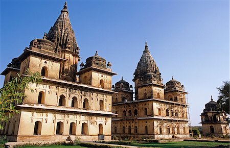 Asia, India, Madhya Pradesh, Orchha.  Chhatris, cenotaphs to Orchha's rulers, located by the Betwa River. Stock Photo - Rights-Managed, Code: 862-06825854