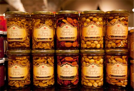 simsearch:862-05997928,k - North Italy, Trentino, Alto Adige, Sud Tirol, Merano. Different types of nuts in syrup on display in a shop Stock Photo - Rights-Managed, Code: 862-06825930