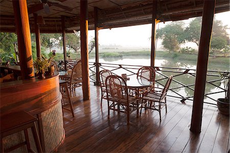 Laos, Ban Khiet Ngong. The bar at the Kingfisher Ecolodge, situated on the edge of Se Pian NPA, a nature reserve in Champasak Province. Stock Photo - Rights-Managed, Code: 862-06826028