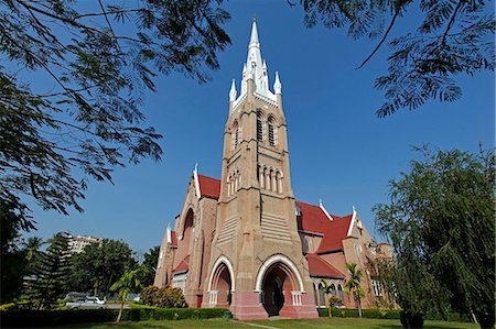 simsearch:862-03887679,k - Rangoon, Myanmar,  Burma. Completed in the 1890s, the Holy Trinity Cathedral is built in the Indo-Saracenic style and remains the city's main Anglican place of worship as well as a noted heritage building. Photographie de stock - Rights-Managed, Code: 862-06826050