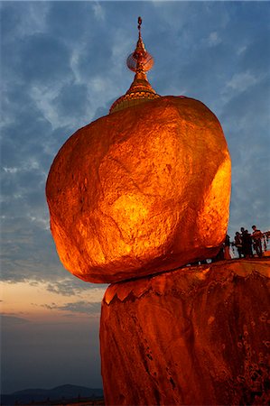 Myanmar, Burma, Mon State, Mt Kyaiktiyo. Mt Kyaiktiyo, or Golden Rock as it is popularly known, due to the continual application of gold leaf by male pilgrims, is one of Burma's most celebrated pilgrimage sites. Stock Photo - Rights-Managed, Code: 862-06826052