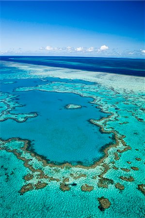 reef - Australia, Queensland, Whitsundays, Great Barrier Reef Marine Park.  Aerial view of 'Heart Reef', a heart-shaped coral formation at Hardys Reef. Stock Photo - Rights-Managed, Code: 862-07495760