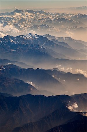 Himalayas seen from the air on flight between Delhi in India and Paro in Bhutan. Stock Photo - Rights-Managed, Code: 862-07495776