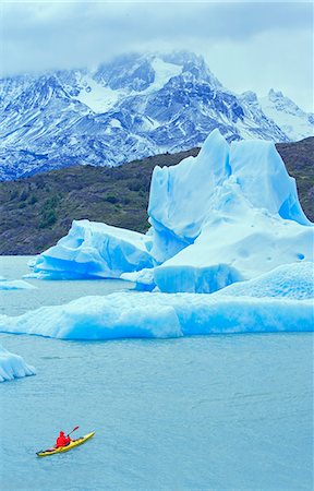 Person kayaking near icebergs, Lago Gray (Lake Gray) (Lake Grey), Torres del Paine National Park, Patagonia, Chile, South America Stock Photo - Rights-Managed, Code: 862-07495873