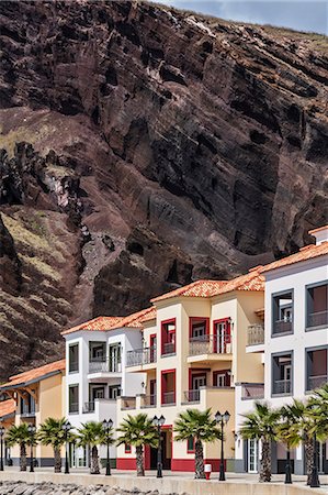 simsearch:862-07496246,k - Holiday villas and quayside promenade at the sea side development of Marina da Quinta do Lorde, Canical, Funchal, Ilha da Madeira, Portugal. Stock Photo - Rights-Managed, Code: 862-07496245