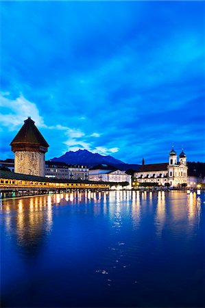 simsearch:862-07496290,k - Europe, Switzerland, Lucerne, water tower and Kapellbrucke, Chapel Bridge on the Reuss River Stock Photo - Rights-Managed, Code: 862-07496291
