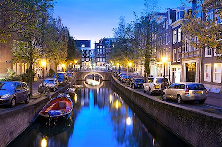 Europe, Netherlands, Holland, Amsterdam, Joordan, Grachtengordel West, a view east along the Blauwburgwal looking towards Lijnbaanssteeg and the city centre. This canal forms part of the Unesco World Heritage site - 'the Seventeenth-century canal ring area of Amsterdam inside the Singelgracht' Stock Photo - Rights-Managed, Code: 862-07650639