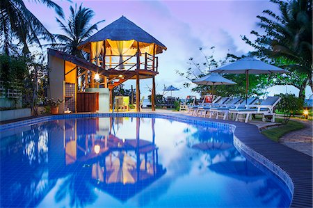 South America, Brazil, Alagoas, Praia do Riacho, sun loungers around the pool at the Pousada Riacho Dos Milagres boutique hotel PR Stockbilder - Lizenzpflichtiges, Bildnummer: 862-07689841