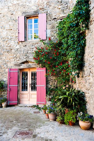 flowers in france - Traditional architecture in Aigne village, Languedoc-Roussillon, France Stock Photo - Rights-Managed, Code: 862-07690000