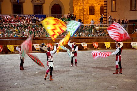 Italy, Tuscany , Pistoia. Flag throwers in Piazza del Dumo for the annual Giostra dell Orso. Stock Photo - Rights-Managed, Code: 862-07690109