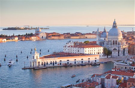 saluting - Italy, Veneto, Venice. The Church of Santa Maria della Salute and the Punta della Dogana. UNESCO. Stock Photo - Rights-Managed, Code: 862-07690100