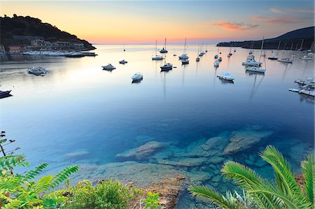 stone harbor - Italy, Italia. Tuscany, Toscana Livorno district. Tuscan Archipelago National Park. Elba island. Porto Azzurro. Stock Photo - Rights-Managed, Code: 862-07690141