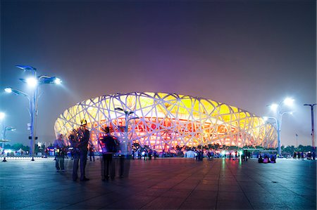 simsearch:862-05997259,k - Beijing, China. Olympic park, National Stadium (called the bird's nest) at night Foto de stock - Con derechos protegidos, Código: 862-07909452