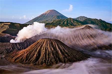 pinecones - Indonesia, Java, Bromo. A stunning volcanic landscape from Mount Penanjakan at sunrise.  Active Mount Bromo (left) and Mount Batok (centre foreground) lie in the Sea of Sand with Mount Semeru in the distance. Stock Photo - Rights-Managed, Code: 862-07910010