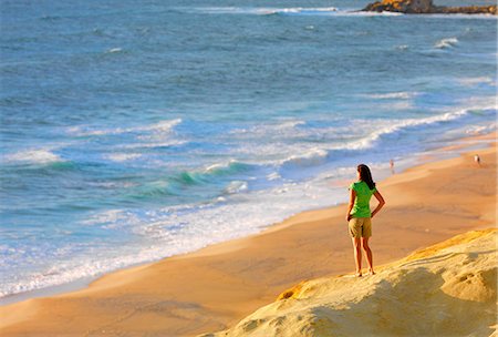 simsearch:862-07910469,k - Portugal, Estramadura, Santa Cruz, Woman watching waves (MR) Stock Photo - Rights-Managed, Code: 862-07910517