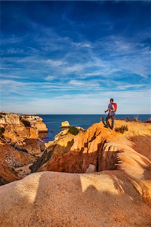 simsearch:862-07910571,k - Hiker overviewing Praia da Marinha, Algarve, Portugal Stock Photo - Rights-Managed, Code: 862-07910568