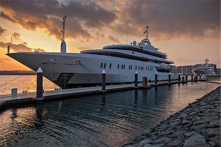 simsearch:862-03360381,k - Luxury yachts moored in the Yas Marina at dawn in Yas West, Abu Dhabi, United Arab Emirates. Stock Photo - Rights-Managed, Code: 862-07910868