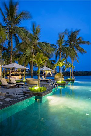 Swimming pool at Hoi An Beach Resort, Cua Dai beach, Hoi An, Quang Ham, Vietnam Photographie de stock - Rights-Managed, Code: 862-07911097