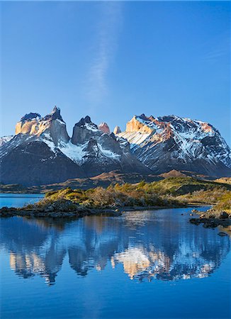 Chile, Torres del Paine, Magallanes Province. The principal attraction of the Torres del Paine National Park is the Paine massif with its granite spires and the contrasting igneous, sedimentary and metamorphic rocks of Ceurnos de Paine. Stock Photo - Rights-Managed, Code: 862-08090050