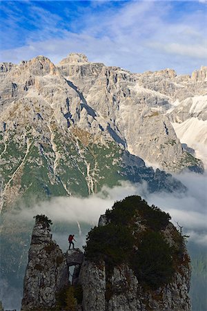simsearch:862-07910100,k - Climber on a rock tower of the Croda Rossa overlooking the Dreischusterspitze, Alta Pusteria, Sexten Dolomites, South Tyrol, Italy, MR Fotografie stock - Rights-Managed, Codice: 862-08090519