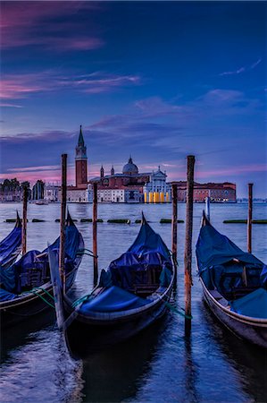 simsearch:862-08091516,k - San Giorgio Maggiore at sunrise with moored gondolas in the foreground, viewed from Riva degli Schiavoni, San Marco, Venice, Veneto, Italy. Stock Photo - Rights-Managed, Code: 862-08090537