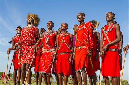 Africa, Kenya, Narok County, Masai Mara. Masai men dancing at their homestead Stock Photo - Rights-Managed, Code: 862-08090833
