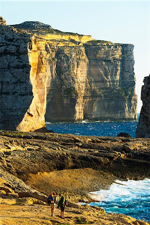 people backpacking - Mediterranean Europe, Malta, Gozo Island, hikers at Dwerja Bay Stock Photo - Rights-Managed, Code: 862-08090929