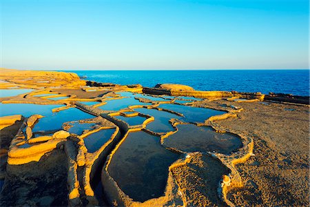 seawater - Mediterranean Europe, Malta, Gozo Island, salt pans at Xwejni Bay Stock Photo - Rights-Managed, Code: 862-08090923