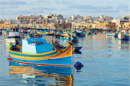 Mediterranean Europe, Malta, Marsaxlokk harbour, colourful fishing boats (dghajsa) Stock Photo - Rights-Managed, Code: 862-08090933