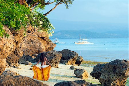 simsearch:862-03360771,k - South East Asia, Philippines, The Visayas, Cebu, Moalboal, a girl on Panagsama Beach (MR) Fotografie stock - Rights-Managed, Codice: 862-08091034