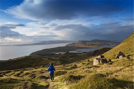 Europe, United Kingdom, Scotland, Skye, Trotternish peninsula, a hiker at the Storr (MR) Photographie de stock - Rights-Managed, Code: 862-08091055