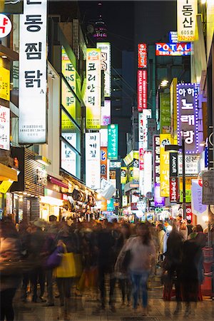 street color buildings - Asia, Republic of Korea, South Korea, Seoul, neon lit streets of Myeong-dong Photographie de stock - Rights-Managed, Code: 862-08091142