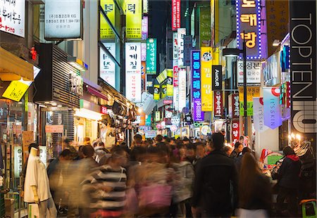 seoul overcrowded - Asia, Republic of Korea, South Korea, Seoul, neon lit streets of Myeong-dong Stock Photo - Rights-Managed, Code: 862-08091143