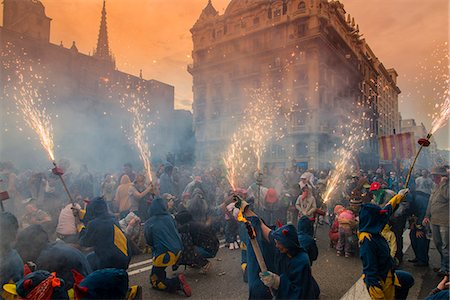 folk tale - Traditional correfocs or fire-runs performing at La Merce festival by using fireworks and effigies of the devil, Barcelona, Catalonia, Spain Stock Photo - Rights-Managed, Code: 862-08091245