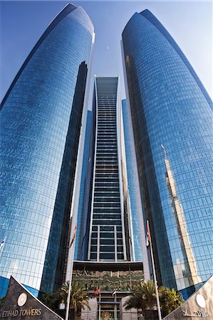 simsearch:862-07910882,k - Tower 4, 3 and 5 of the Etihad Jumeirah Towers designed by the Architects DBI Design, Al Ras Al Akhdar, Abu Dhabi, United Arab Emirates. Stock Photo - Rights-Managed, Code: 862-08091340